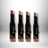 Image of four ExZachly Perfect Two-tone eye shadow stick lazy eye shadows in different shades. Each eye shadow stick is in a sleek black tube with gold detailing. The shades range from a deep pink to a deep brown, perfect for neutral skin types. These waterproof eye shadows are set against a subtle gradient background, highlighting their vibrancy.